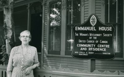 Stella Bury standing in front of Emmanuel House